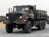 US_Marine_Corps_030224-M-XT622-034_USMC_M923_(6X6)_5-ton_cargo_truck_heads_a_convoy_departing_...jpg